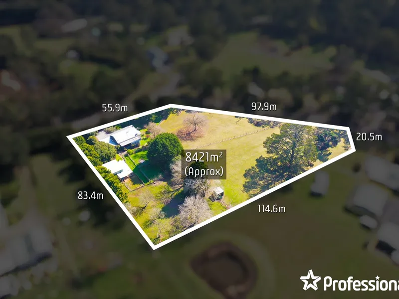 FARMHOUSE FIXER-UPPER ON OVER 2 ACRES