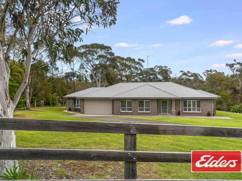 Immaculate young home and shed sensation on over 1.5 acres!