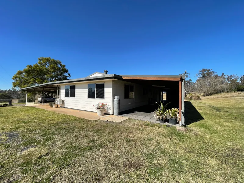 TIDY THREE BEDROOM HOME ON A LARGE BLOCK WITH A PEACEFUL OUTLOOK.