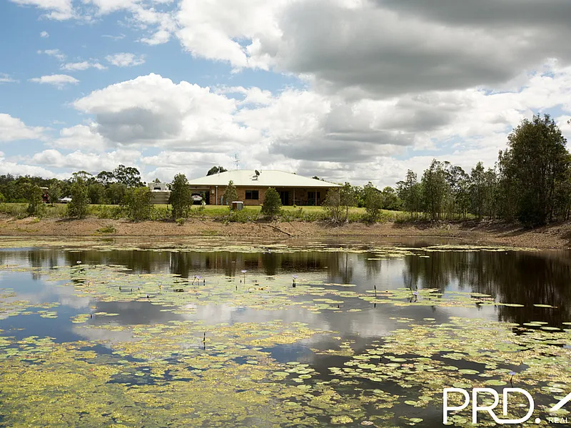 OWNERS WANT TO SELL NOW! COUNTRY HOMESTEAD ON 40 ACRES WITH  WATER