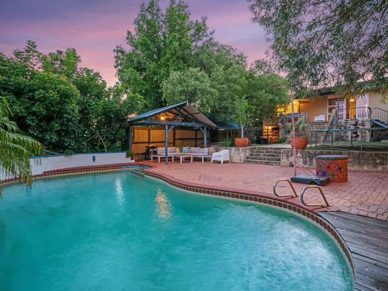 ELEVATED FAMILY HOME ON FULL BLOCK!
