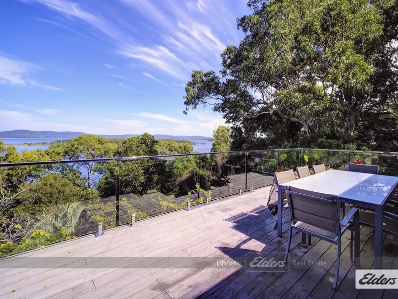 WATERFRONT HOME WITH BREATHTAKING VIEWS.