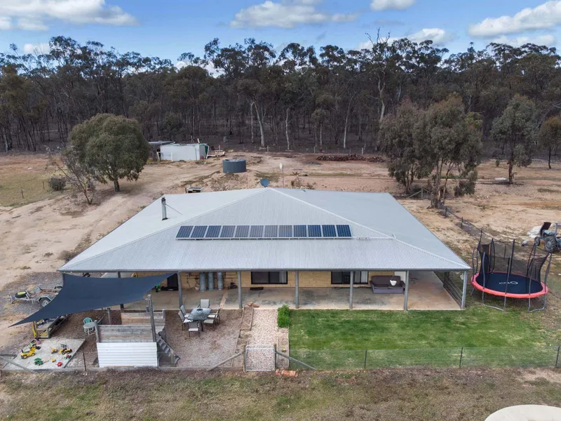 Perfectly integrated into the environment cobblestone brick homesteader with deep wrap around verandahs! (Approx 18.78 acres)