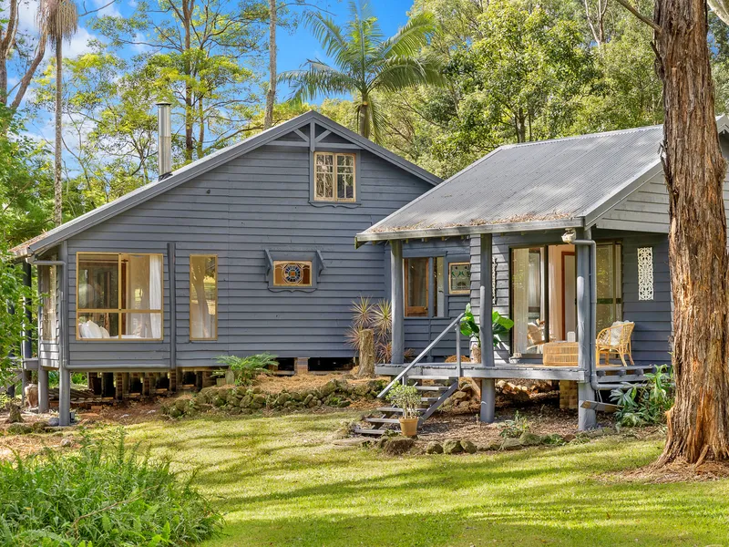 Tranquil acreage hideaway with creek frontage