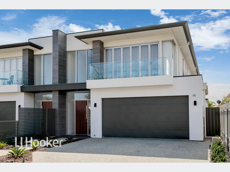 EXECUTIVE LIVING IN ADELAIDE'S FINEST BEACH SUBURB