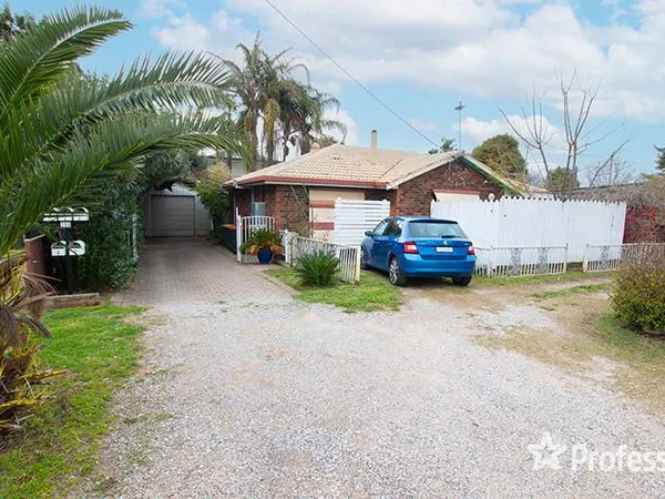 INVESTMENT OPPORTUNITY - 3 BEDROOM HOUSE PLUS 4 UNITS