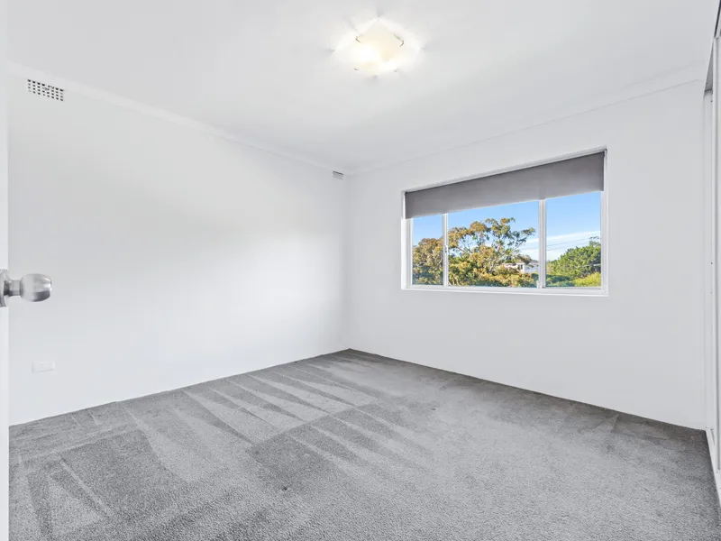 TOP FLOOR 1 BEDROOM + STUDY WITH SECURE LOCK UP GARAGE