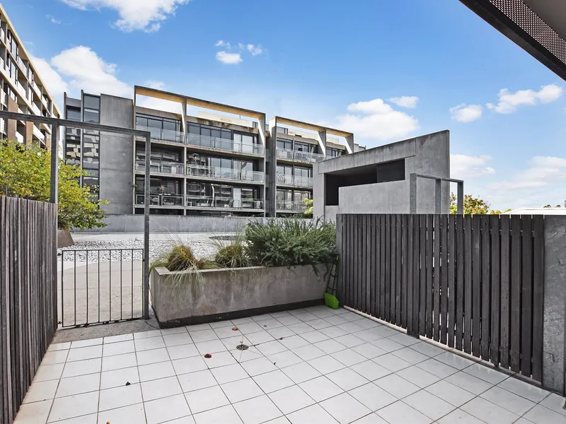 RARE TWO LEVEL APARTMENT IN THE HEART OF CARLTON