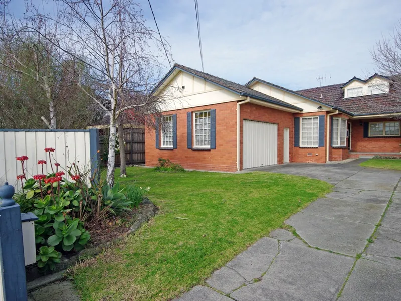 INTRIGUING HOME WITH 5 BEDROOMS AND IN THE MCKINNON ZONE