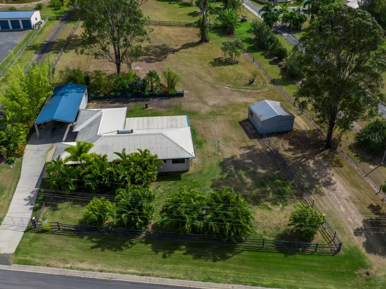 Acreage living with 2 sheds