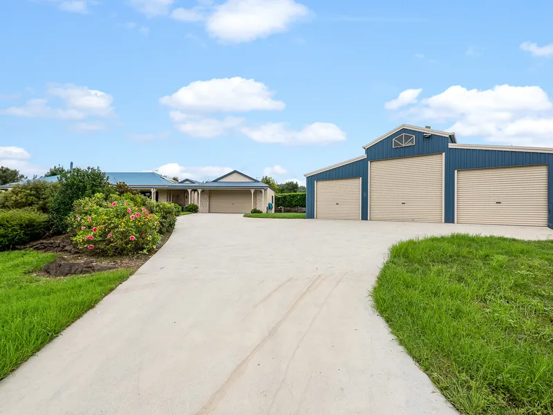 Private Acreage Living at its Finest