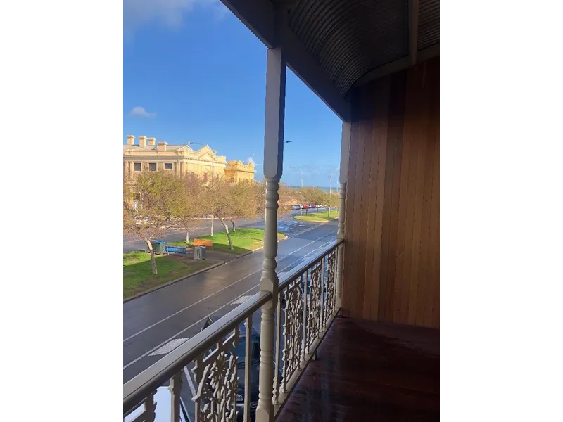 First floor Semaphore road unit. Prime location with sea views.