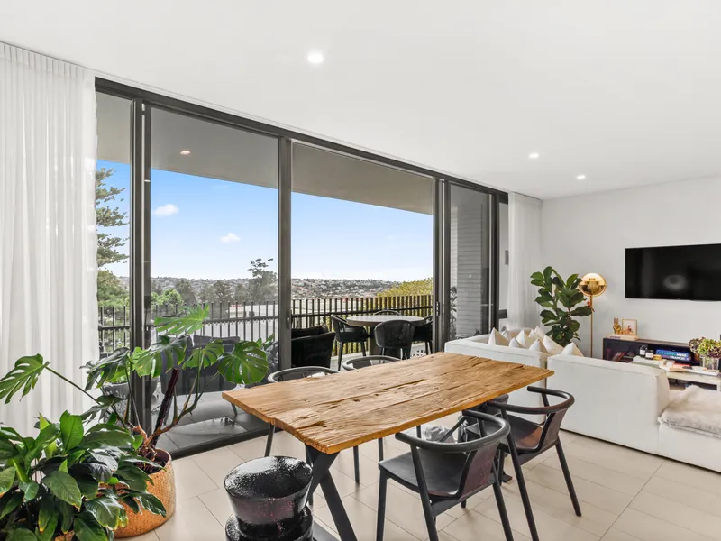 A LUXURIOUS TWO BEDROOM OASIS IN 'THE MORETON' WITH LARGE ENTERTAINERS' BALCONY