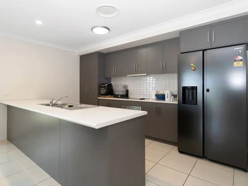 SPACIOUS FAMILY HOME IN THE HEART OF HIGH CALIBRE ESTATE.