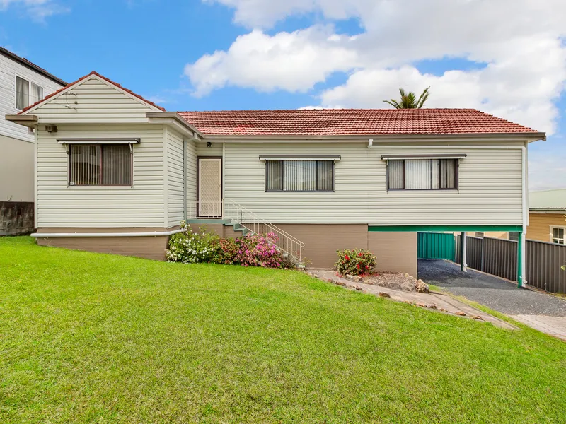 Large 4 bedroom home set high on a hill with views