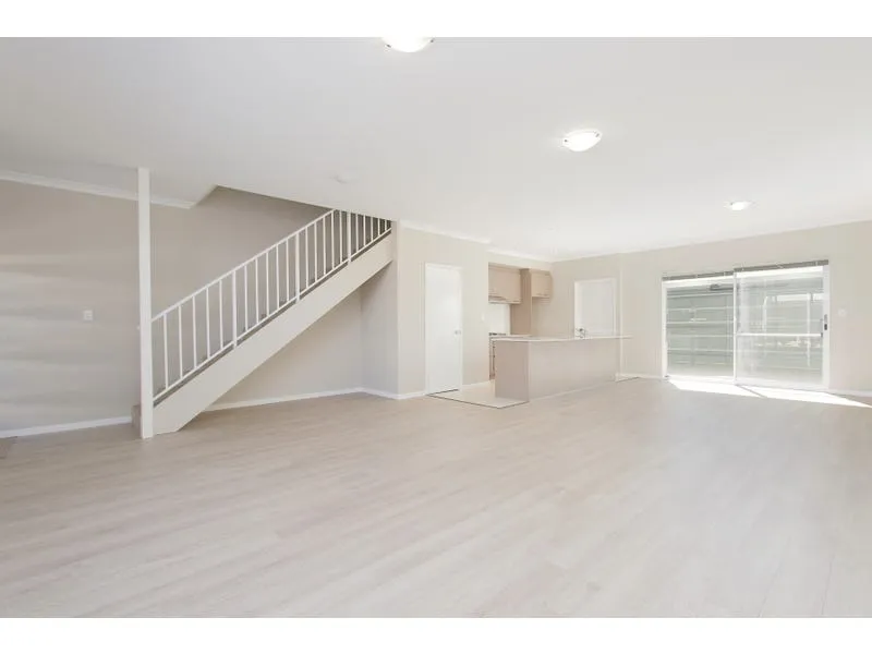 LOW MAINTENANCE TOWNHOUSE IN QUIET COMPLEX CLOSE TO THE ESTUARY