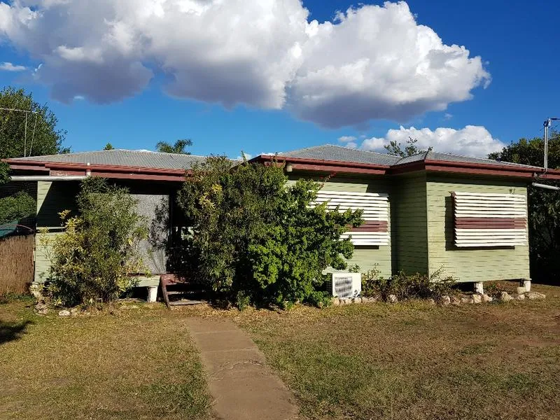 4 BEDS ON 1/4-ACRE WITH SOLAR UNDER $200K