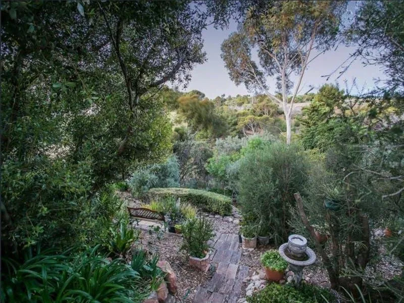 Fully Furnished includes utilities & internet. Quiet, bushland garden unit near sea at Marino.