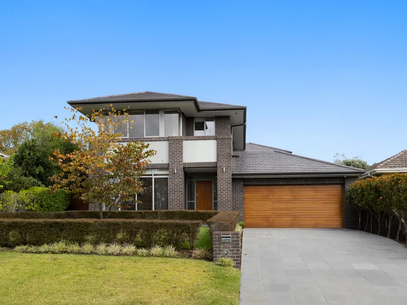 Luxurious 4-Bedroom Home with Pool and Landscaped Gardens