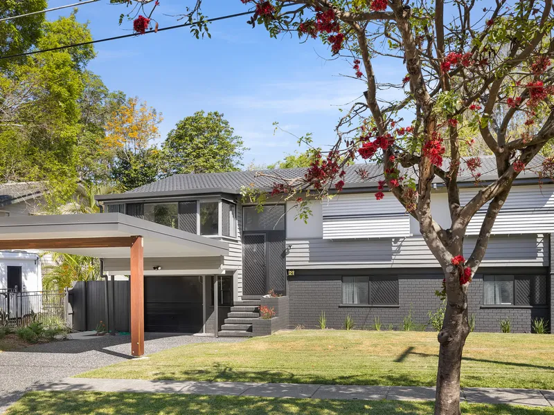 Updated brick and tile home with leafy vistas and direct creek access