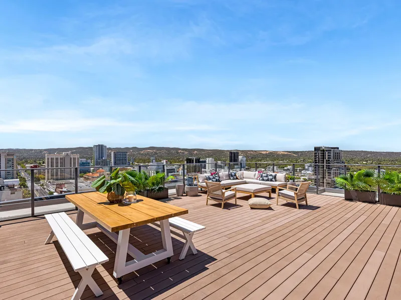 AN EXCLUSIVE THREE BEDROOM APARTMENT WITH PRIVATE ROOFTOP DECK