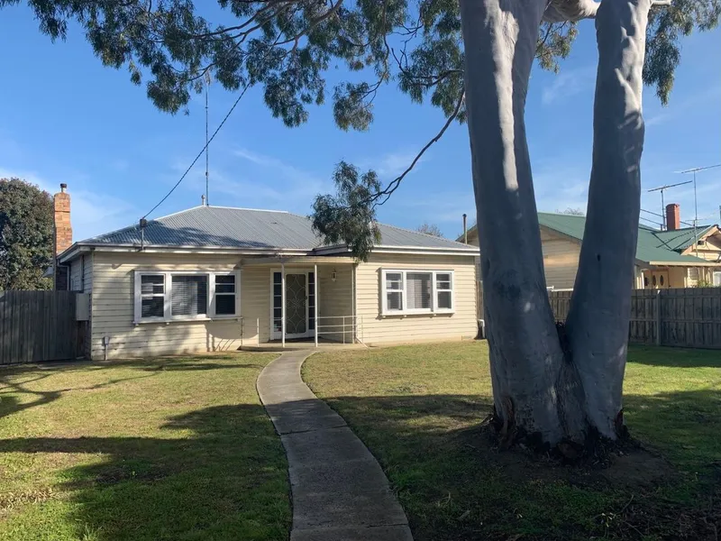 Older style home in central location with a large backyard.