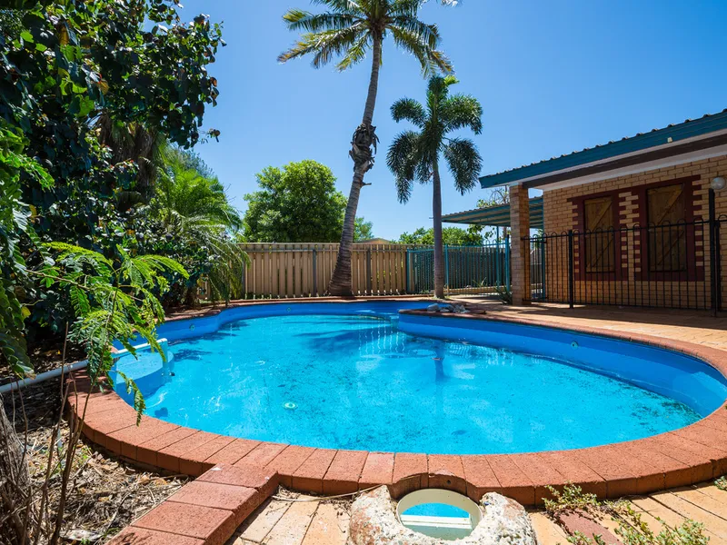 BRICK VILLA WITH BELOW GROUND POOL