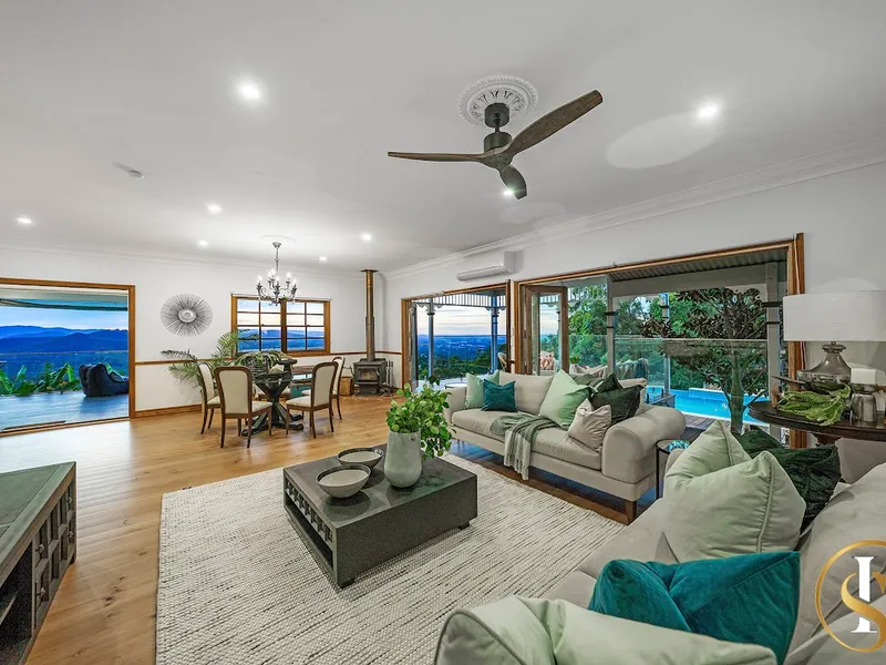 A FAMILY TROPHY HOME CAPTURING POSTCARD VIEWS