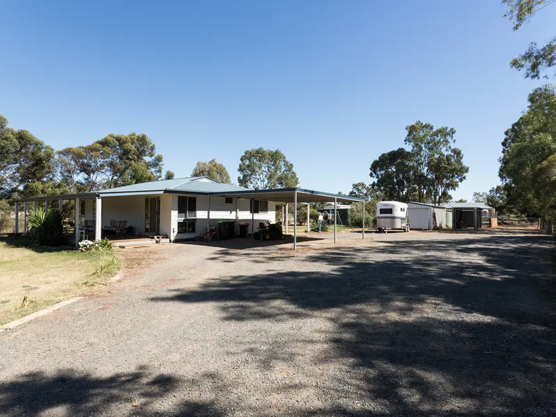 1.2 Acres with neat home and shed