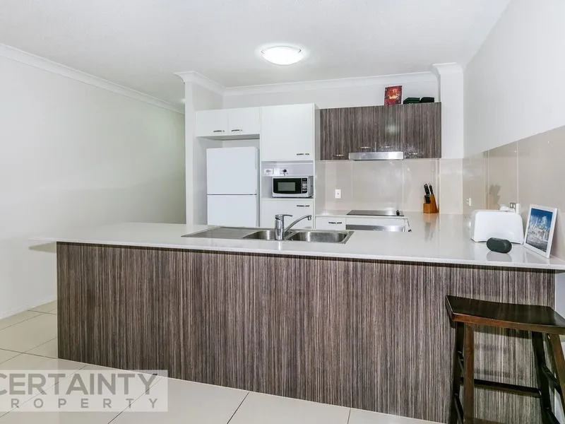 Modern and Spacious unit in gated complex