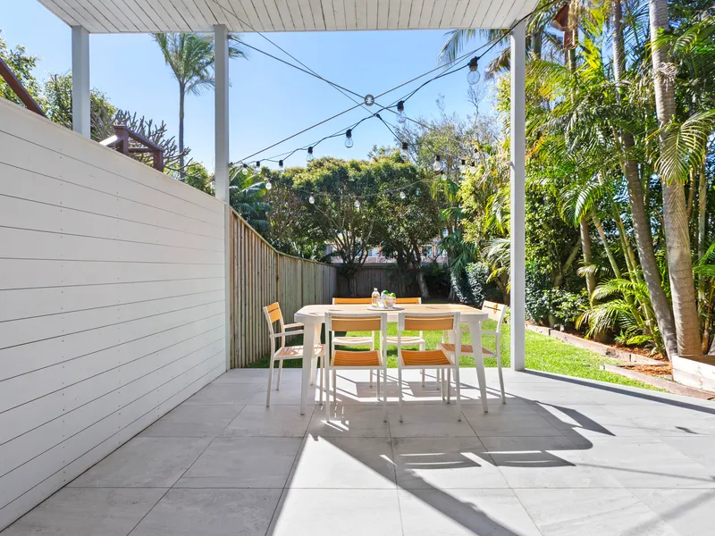 Beachside bliss in immaculate lower duplex