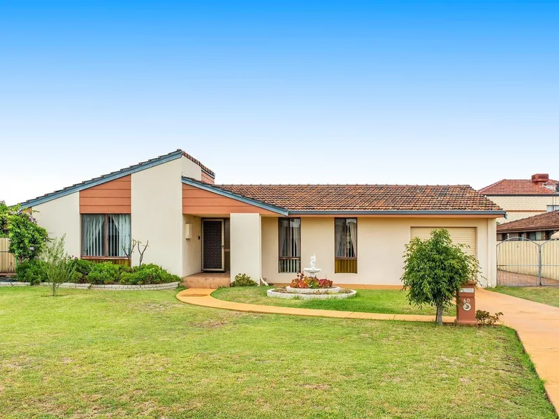 TRADITIONAL FAMILY HOME HAS BEEN LOVINGLY KEPT WITH MANY HAPPY MEMORIES OF FAMILY AND FUN TIMES