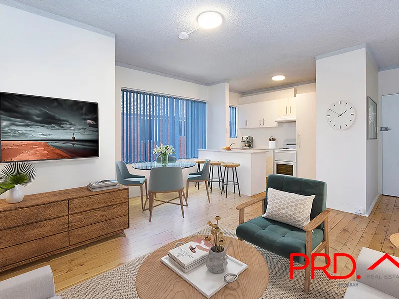 RENOVATED UNIT IN UNBEATABLE LOCATION