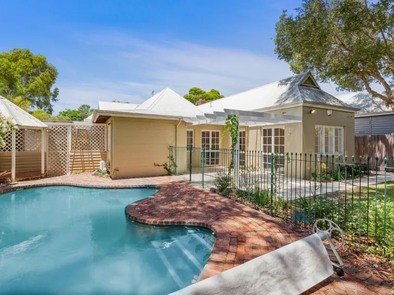 Quietly nestled in a picturesque and peaceful cul-de-sac is this unforgettable Edwardian renovated home.