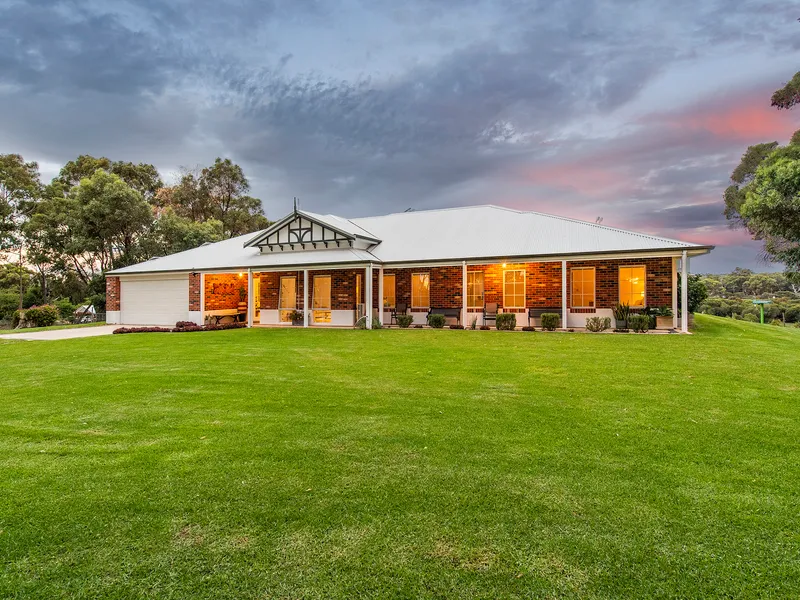 IMPRESSIVE PLUNKETT HOME ON BREATHTAKING PROPERTY