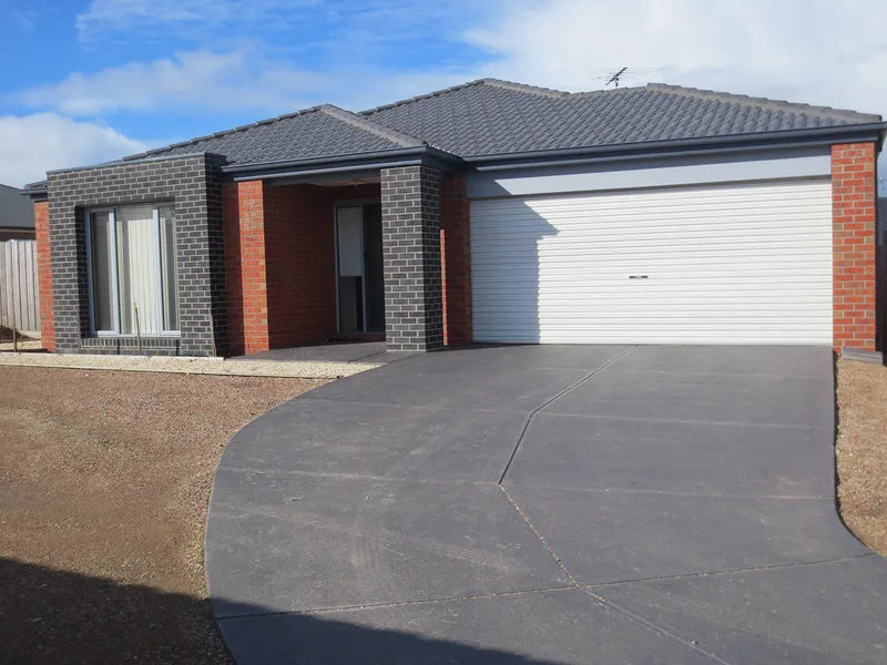 Modern Family Home with Low Maintenance yard.