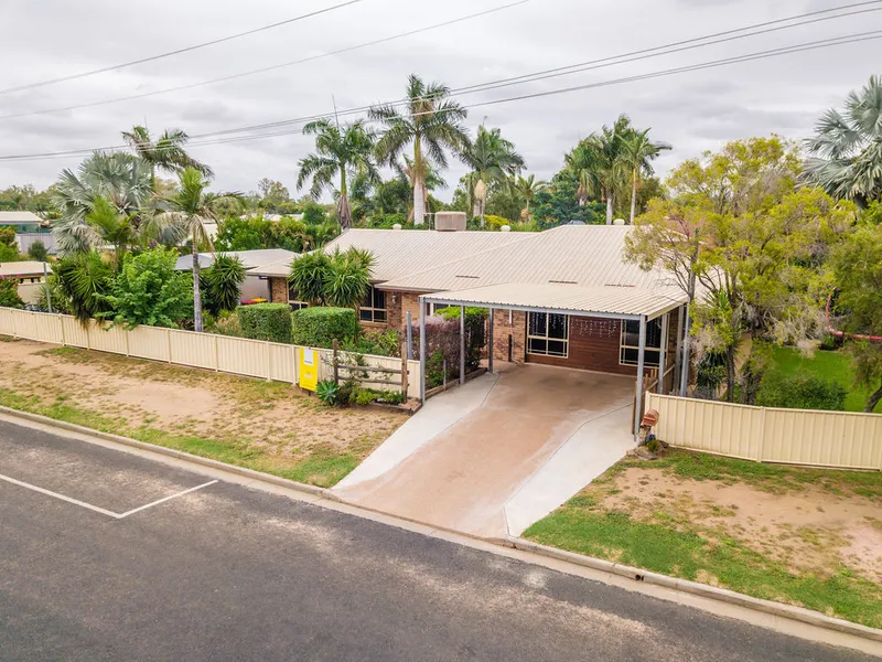 NEAT LOW SET BRICK HOME WITH SHED