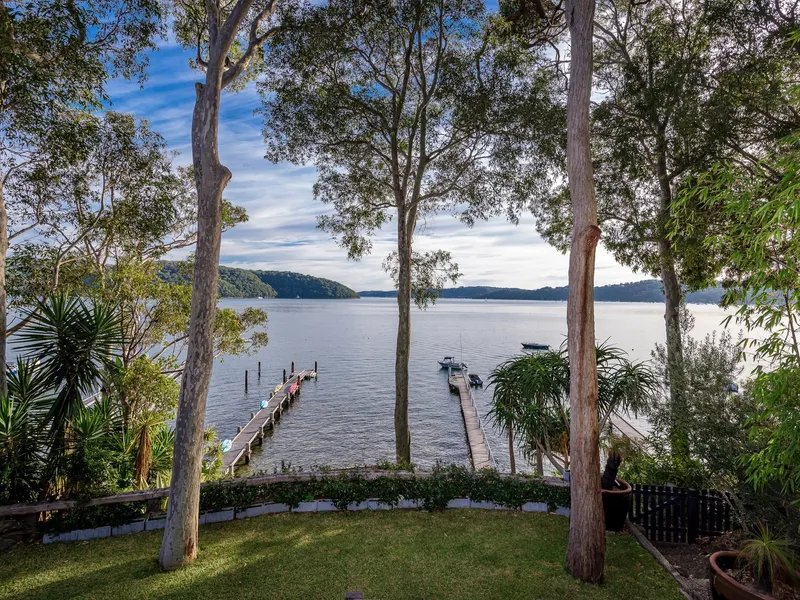 Charming North facing waterfront on a flat block boasting magnificent Pittwater views with a private, deep-water jetty.  