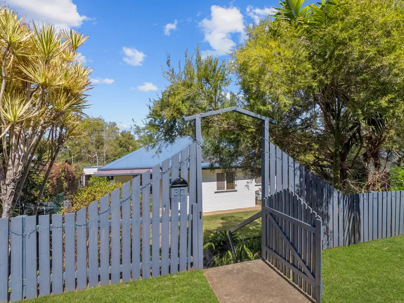 Dual Living Colonial Home with Massive Shed!