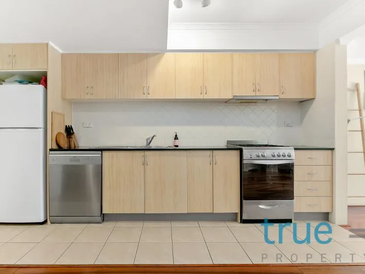 PERFECTLY LOCATED SPLIT-LEVEl APARTMENT