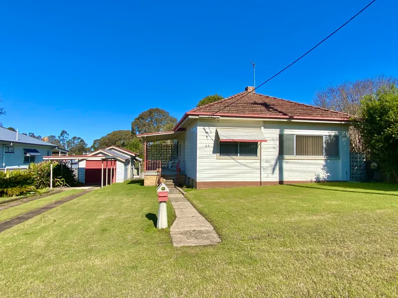 Tidy two bedroom home with storage space