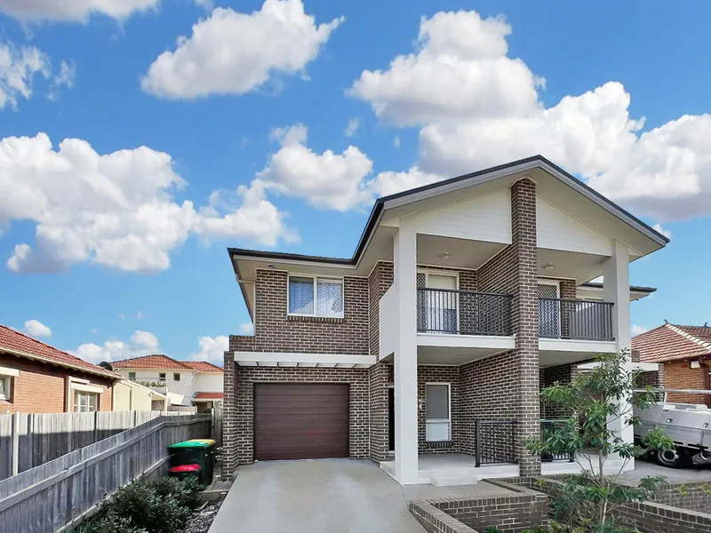 Brand new with grand design this four bedroom home features stylish sleek finishes and is perfect for the family.