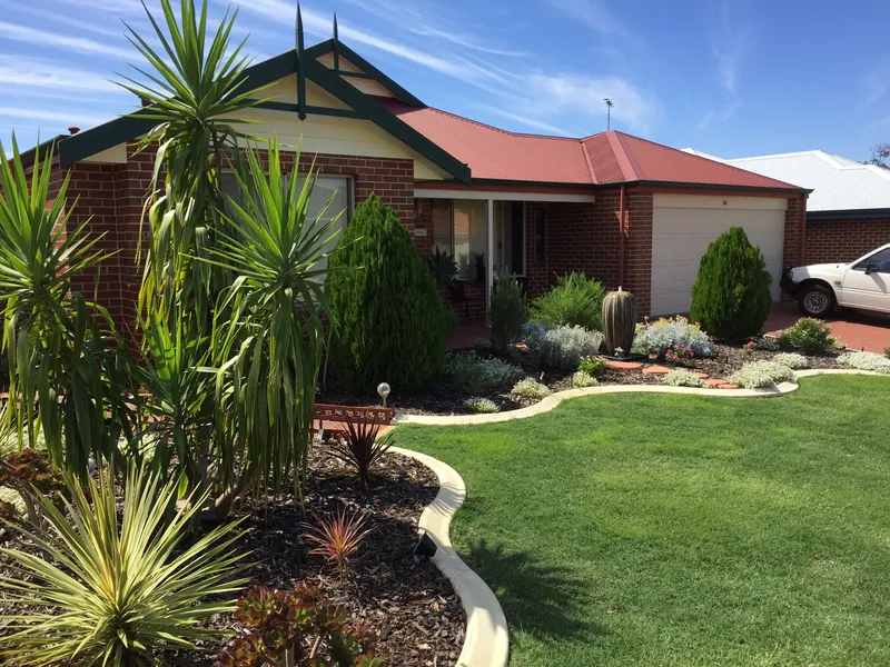 Sitting in the idyllic private estate of College Groove is the perfect family home.