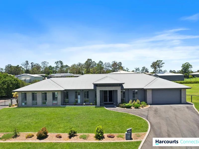 Embrace country living and enjoy ducted aircon, multiple living spaces and triple-bay shed