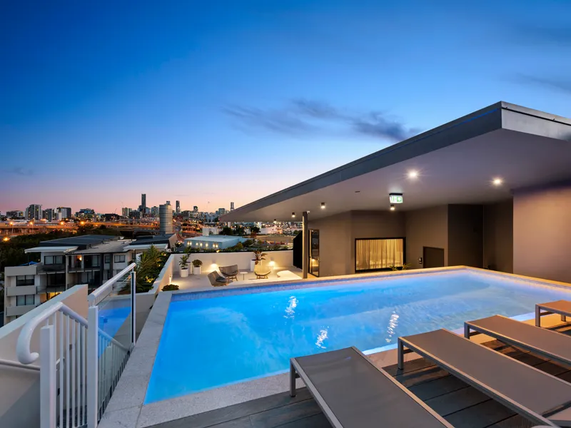 Designer style and luxury living with a rooftop pool
