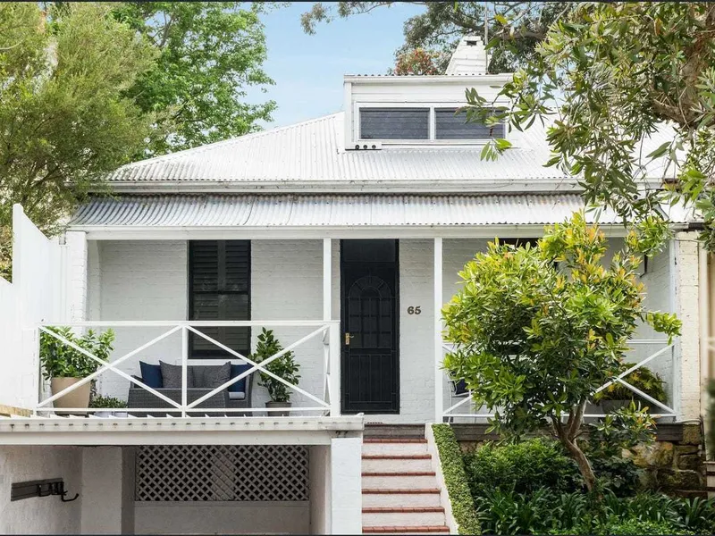 A captivating home, in a picturesque garden setting.