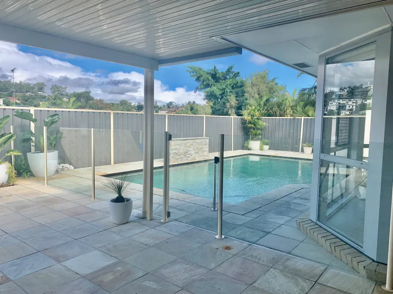 FURNISHED 4 BEDROOM FAMILY HOME WITH INGROUND POOL AND OUTDOOR ENTERTAINING AREA.