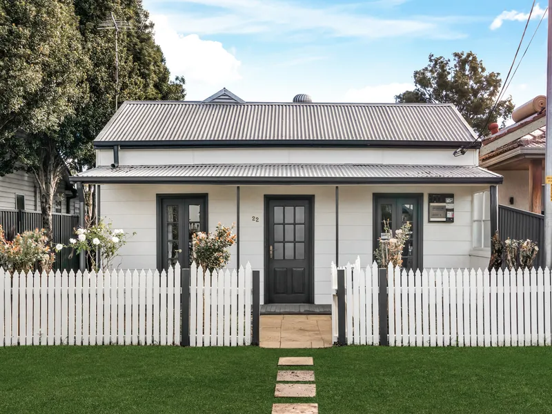 Character filled cottage in picturesque street