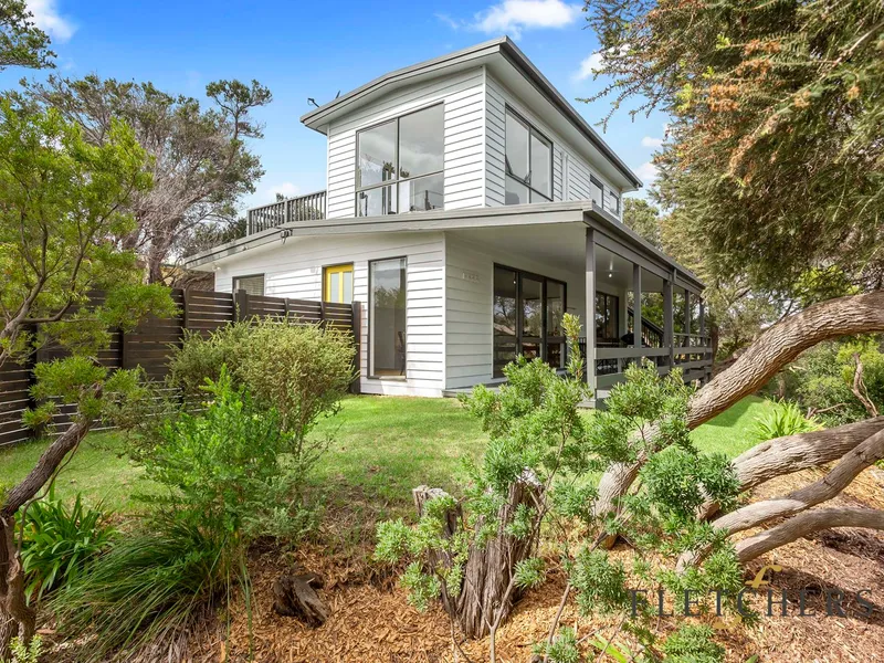 Boasting serene privacy amongst the tree-tops with Bay Views