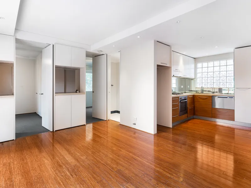 Beachside apartment with undercover parking & large balcony 